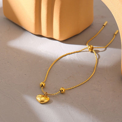 Bracelet Zoé plaqué or 18 carats avec pendentif cœur en nacre