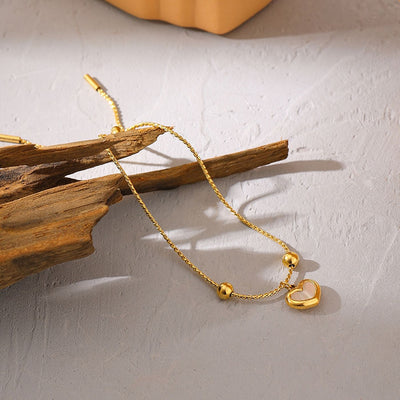 Bracelet Zoé plaqué or 18 carats avec pendentif cœur en nacre